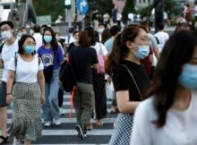 Residents wearing masks in Beijing