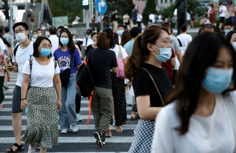 Residents wearing masks in Beijing