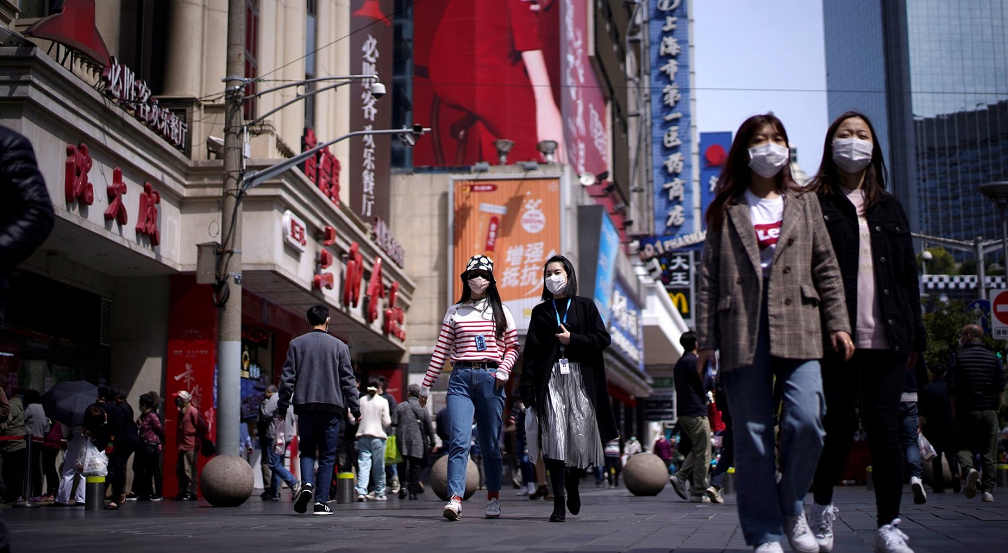 Shoppers in Shanghai, before the restrictions put in place in response to the Covid outbreak