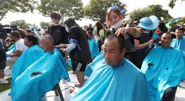 South Koreans Shave Heads To Protest Missile Shield