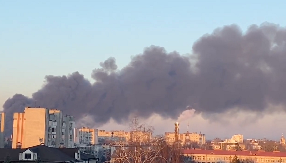 A building burns following a Russian airstrike close to Lviv airport in western Ukraine