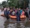 People being rescued from flooding in Assam