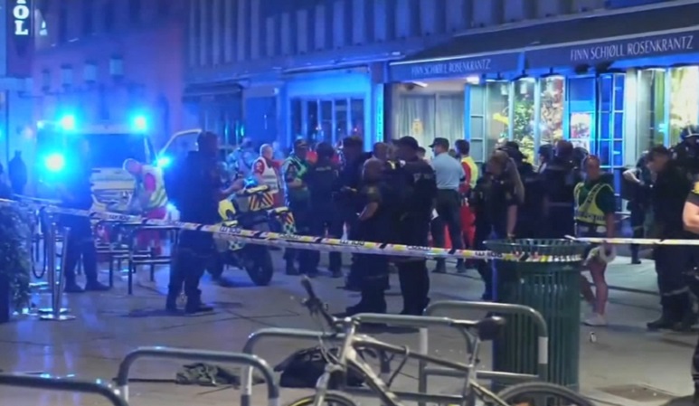 Police cordon off an area in central Oslo following a fatal mass shooting