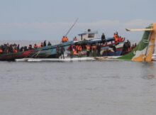Emergency personnel retrieve the plane from Lake Victoria