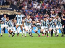 Argentina's players burst into celebration as the winning penalty is scored
