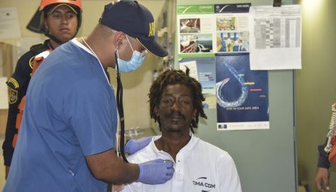 The man undergoes medical checks after being rescued